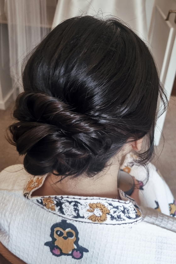 Dark brown hair twisted updo